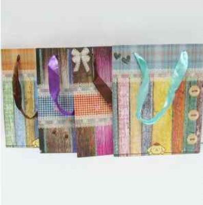 Пакет Josef Otten, Яскраві фарби, папір, 8,5*17*21 см, мікс (1) Пакет Josef Otten, Яскраві фарби, папір, 8,5*17*21 см, мікс (1)