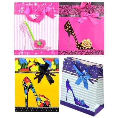 Пакет подарунковий "Туфелька" 18*21*8,5см (1) Пакет подарунковий "Туфелька" 18*21*8,5см (1)