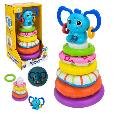 Пірамідка муз. арт. PL-724-85 "Сонячний зайчик",батар.у комплекті, кільця тканеві та пласт., р-р 23* Пірамідка муз. арт. PL-724-85 "Сонячний зайчик",батар.у комплекті, кільця тканеві та пласт., р-р 23*